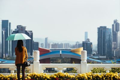 woman looking at the city